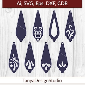 May include: A digital template featuring nine navy blue teardrop-shaped earring designs with various decorative cutouts. The designs include floral and geometric patterns. The text "Ai, SVG, Eps, DXF, CDR" is at the top. The TanyaDesignStudio logo is at the bottom.