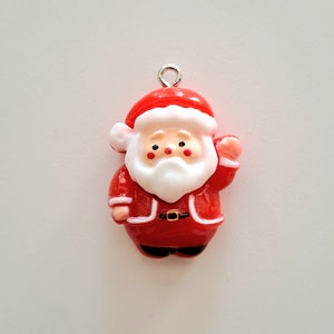 1 resin Santa Claus charm