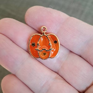 1 halloween pumpkin bead charm, resin with golden borders image 1