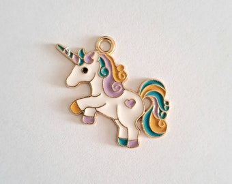 1 unicorn pendant charm enamelled colors golden outlines size 26 x 34 mm