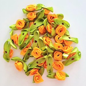 20 small orange satin roses +- 2 cm