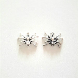 2 silver metal spider charms aged