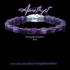May include: A purple amethyst bracelet with silver metal detailing. The bracelet is made up of amethyst stones and rectangular metal links. The word "Amethyst" is written in cursive at the top of the image.