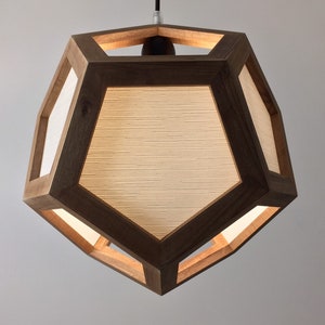 Hanging lamp - dodecahedron hung by a vertex with shades on the six central faces of the solid- high quality solid walnut wood