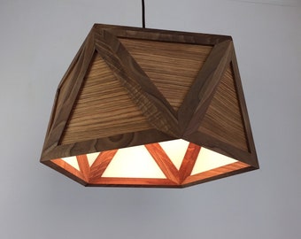 Pendant light in oak veneer shades European walnut frame dining table light directional light