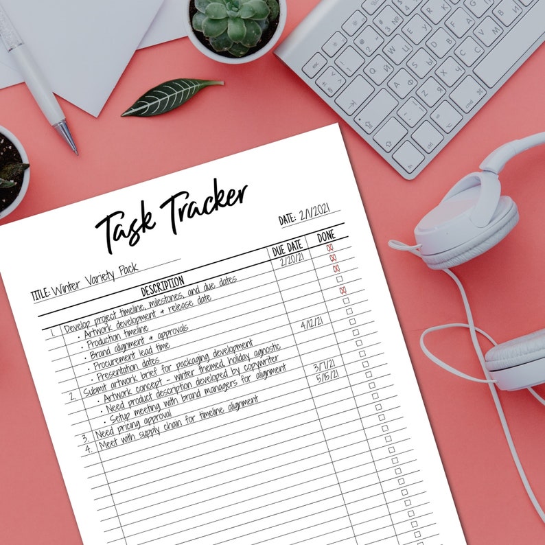 May include: A white printable task tracker sheet with a black title "Task Tracker" and the text "TITLE: Winter Variety Pack" and "DATE: 2/1/2021". The sheet has columns for "DESCRIPTION", "DUE DATE", and "DONE".