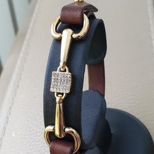 horsebit bracelet in leather and gold-plated steel SQUARE