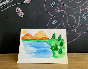Hand-painted watercolour birthday card of a mountain lake