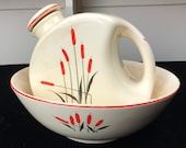 Two Vintage Universal Potteries Sears Roebuck Co. Cattails Pieces, Water Jug and Serving Bowl