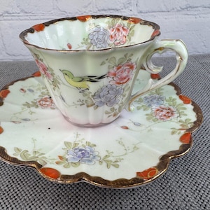 Antique Meiji Period Japanese Kutani Ware Porcelain Demitasse Cup and Saucer, Gorgeous Bird Floral Decoration Scalloped Edge