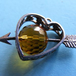 May include: A set of three ceramic mugs with a speckled, matte finish. The mugs are in shades of cream, light gray, and dark gray. Each mug has a simple, minimalist design, perfect for coffee or tea.