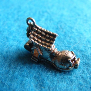 C) Vintage Sterling Silver Charm  Boot opens to a  family