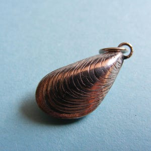 Vintage sterlingsilverberlock: Muskelsnäcka (O)