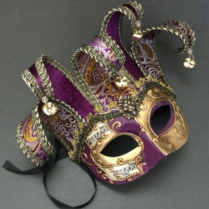 Purple Jolly Jester Mardi Gras Masquerade Feather music mask on stick