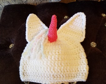 childs hand crocheted unicorn hat with mane and horn