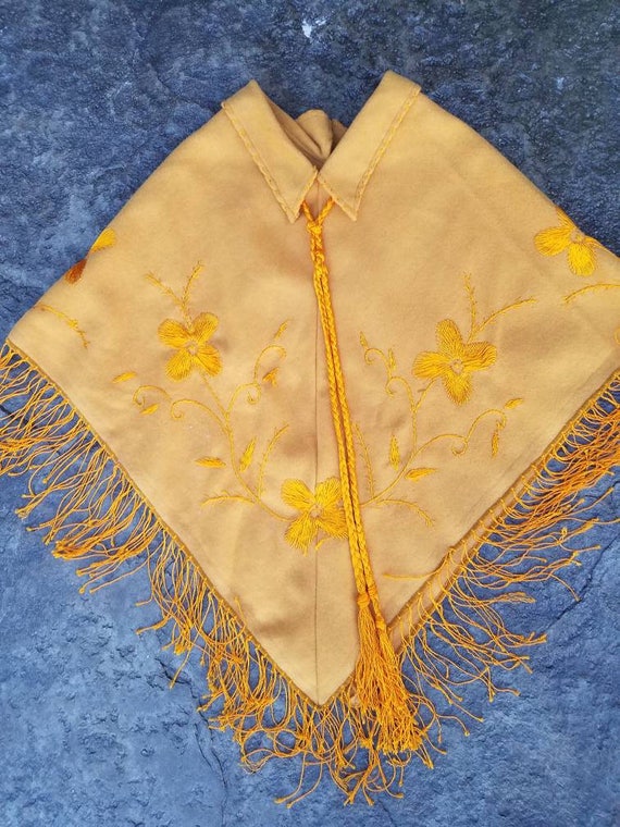 1970s embroidered mustard yellow poncho