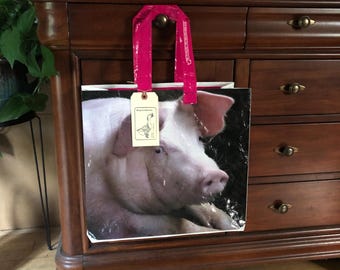 Up cycled pig feed bag made into a reusable tote from a recycled grain sack