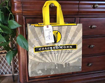 Up cycled grain bag made into a reusable tote with a recycled cracked corn sack / eco friendly shopping