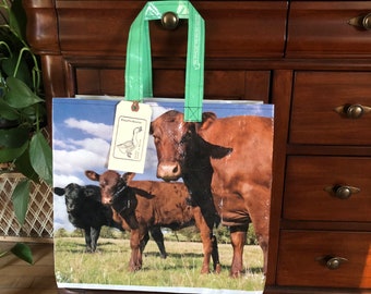 Up cycled red angus cow grain bag made into a reusable tote / recycled feed sack