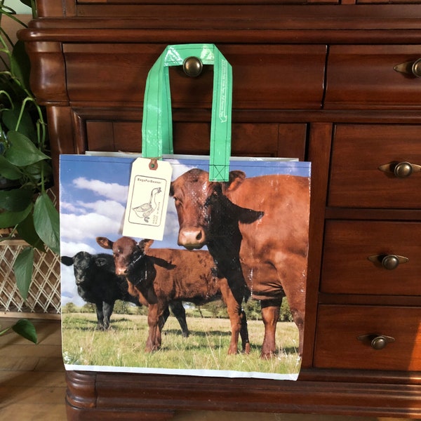 Up cycled red angus cow grain bag made into a reusable tote / recycled feed sack