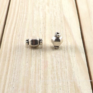 Antique Silver Tibetan Style Lantern Alloy Spacer Beads | Antique Silver Color | Approximate Size 10x7mm; Hole 1mm; Strand 7.5"