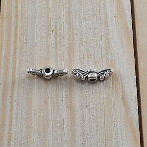 57 pcs Antique Silver Color Wing Tibetan Style Spacer Beads | Aprox Size  4.5x14x3.5mm