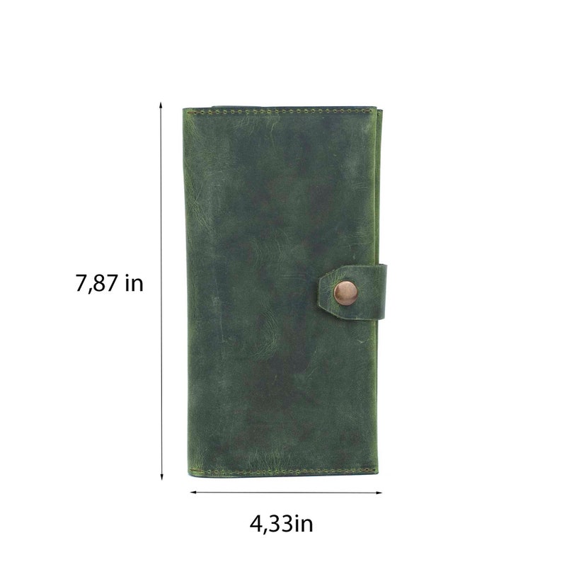 May include: A green leather wallet with a button closure. The wallet is 7.87 inches tall and 4.33 inches wide. The leather has a distressed appearance. The wallet is designed to hold cards and cash.