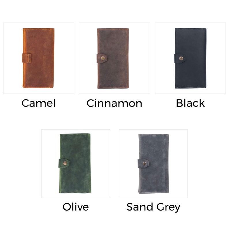 May include: A collection of five leather wallets in various colors: camel, cinnamon, black, olive, and sand grey. Each wallet is rectangular with a snap closure. The names of the colors are displayed below each wallet.