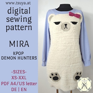 May include: A light blue long-sleeved dress with a white bear-shaped design. The bear has black eyes, a black nose, and a pink bow. The dress includes the text "digital sewing pattern MIRA KPOP DEMON HUNTERS".