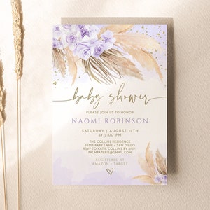 May include: A purple and gold baby shower invitation with a watercolor floral design. The invitation includes the text "baby shower", "Please join us to honor", "Naomi Robinson", "Saturday August 12th at 2:00 PM", "The Collins Residence", "55555 Baby Lane San Diego", "RSVP to Katie Collins by 8/07", "Palmpaperie@gmail.com", "Registered at Amazon Target", and a heart symbol.