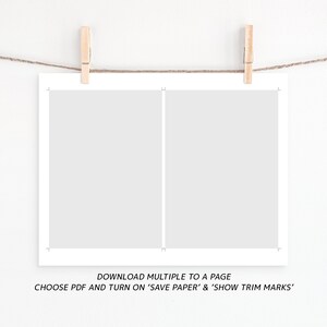 May include: A white sheet of paper with a vertical line down the center, hanging from a string with wooden clothespins. The text below the paper reads "DOWNLOAD MULTIPLE TO A PAGE CHOOSE PDF AND TURN ON 'SAVE PAPER' & 'SHOW TRIM MARKS'".