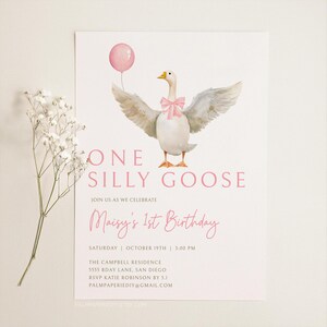 May include: A pink and white birthday invitation with a watercolor illustration of a goose holding a pink balloon. The text reads "One Silly Goose" and "Maisy's 1st Birthday".