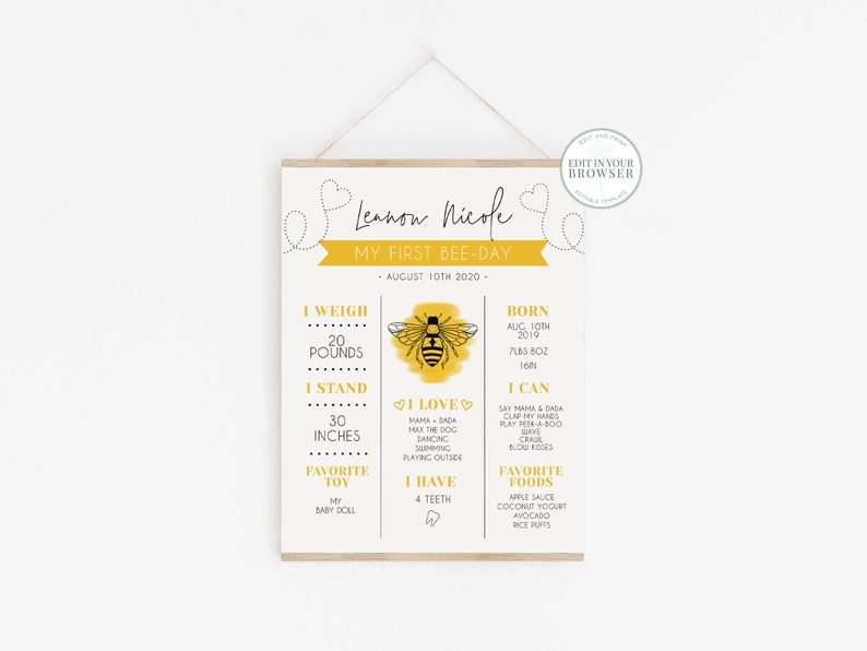 May include: A yellow and black bee-themed printable poster for a first birthday. The poster includes the child's name, "Leanon Nicole", and details about their first year, such as their weight, height, favorite foods, and things they can do. The poster is decorated with a cute bee illustration.