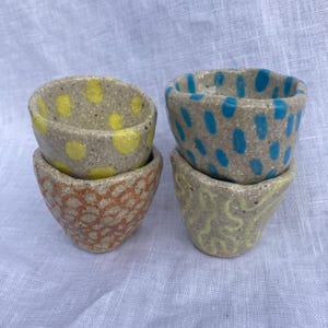 Colourful, patterned ceramic shot glasses / espresso cups