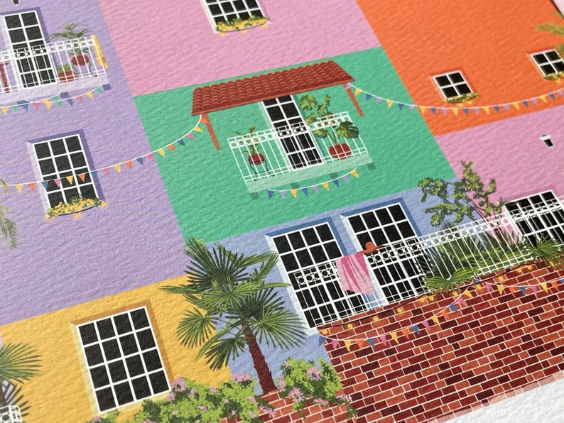 Detailed view of an illustration print of Lecheria in Barcelona, Venezuela. Cute, colourful houses enjoying a sunset view of the beach.