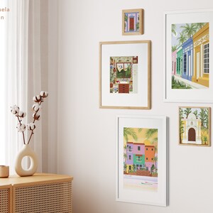 A collection of Venezuelan art prints in the form of a gallery wall.