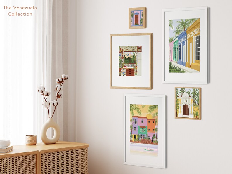 A collection of Venezuelan art prints in the form of a gallery wall.