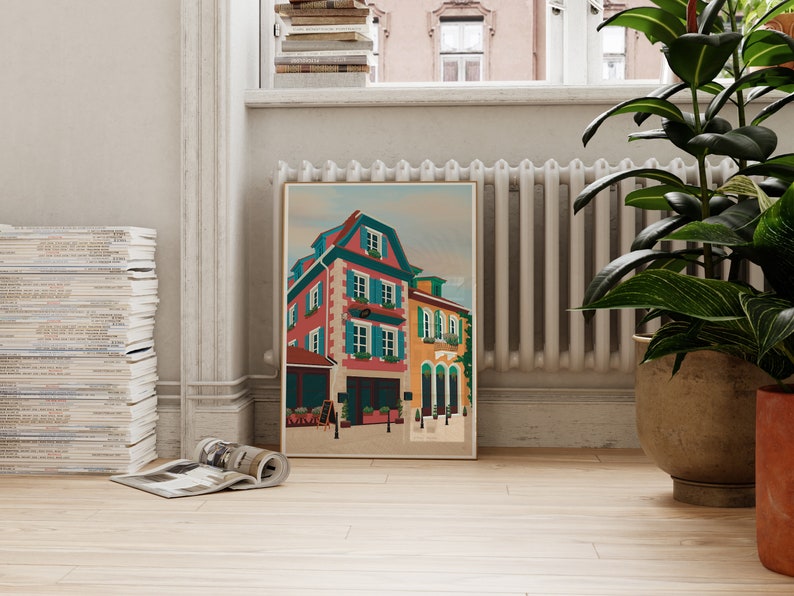 Art print depicting the colourful buildings of Alsace, France, adorned with flowers on a cobble stone street.