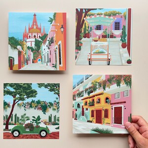 A set of four Mexican illustration prints featuring an elotes food cart, Puerto Vallarta, Mexico City green VW Beetle taxi, and San Miguel de Allende