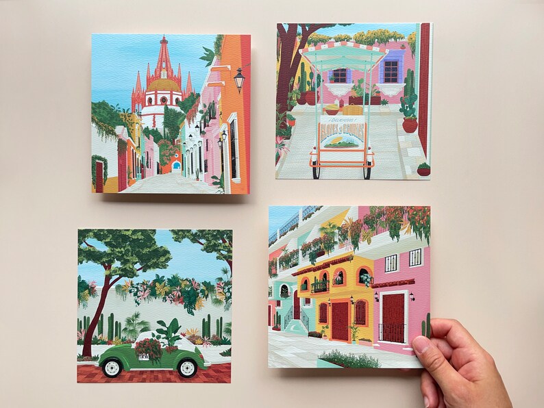 A set of four Mexican illustration prints featuring an elotes food cart, Puerto Vallarta, Mexico City green VW Beetle taxi, and San Miguel de Allende