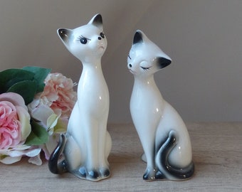 Set of two vintage black and white ceramic long neck romantic cats