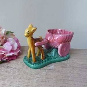 Pink pot cover, pot, vase, empty pocket figurine in the shape of a Bambi Biche in ceramic, vintage fawn planter pulling a kitsch cart