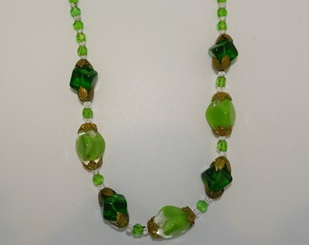 Beautiful Art Deco Czech green and clear glass beaded necklace with metal floral embellishments - Czeckoslovakian