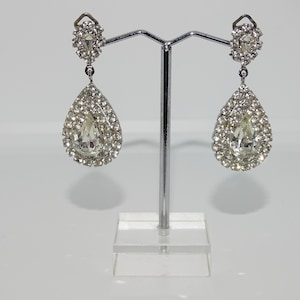 Vintage costume jewellery teardrop shaped silver tone metal clip on earrings with beautiful clear/ white rhinestones drop