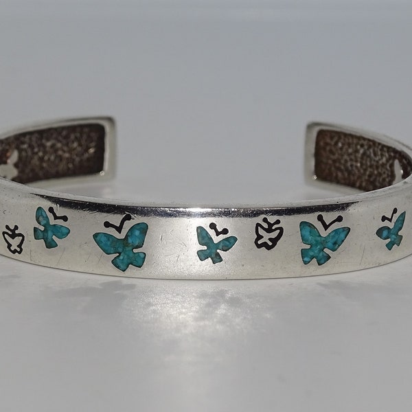 Sterling silver 925 Navajo style cuff bracelet decorated with turquoise stone chips inset butterflies