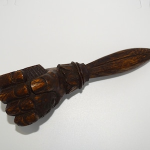 Beautiful antique novelty wooden fist/ hand holding a nut carved nutcracker