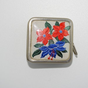 vintage small measuring tape measure with beautiful embroidered colour floral scene