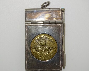 Beautiful vintage Chatelaine Aide Memoire notepad with Cherub medallion to the front and propelling pencil with turquoise stone