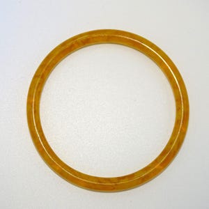 Beautiful vintage costume jewellery orange mottled plastic bangle
