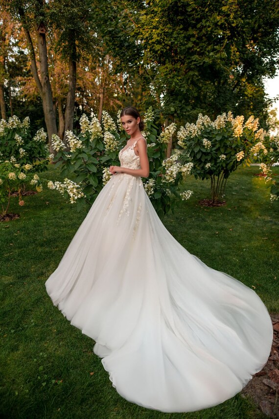 Bride in Wedding Dress With Flowing Veil